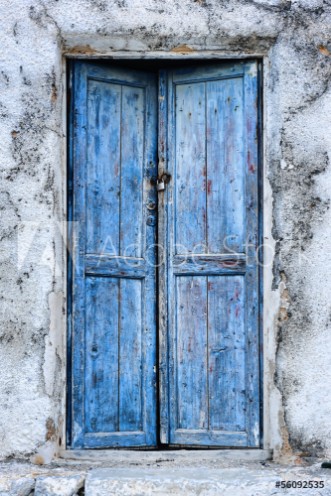 Picture of Old weathered blue door in Perissa